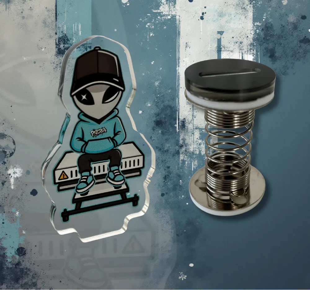 Figurine Alien POZCREA démontée – personnage en hoodie turquoise à côté de la base à ressort