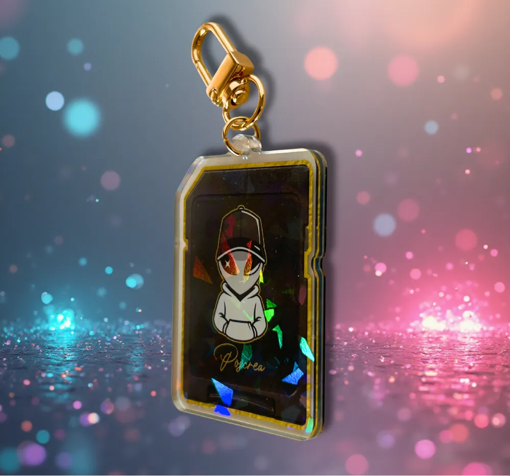 Porte-clé Alien Gold SD suspendu – recto holographique à reflets bleus